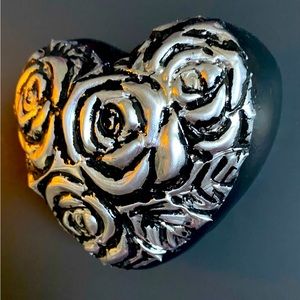 Wall hanging cast and embossed heart.